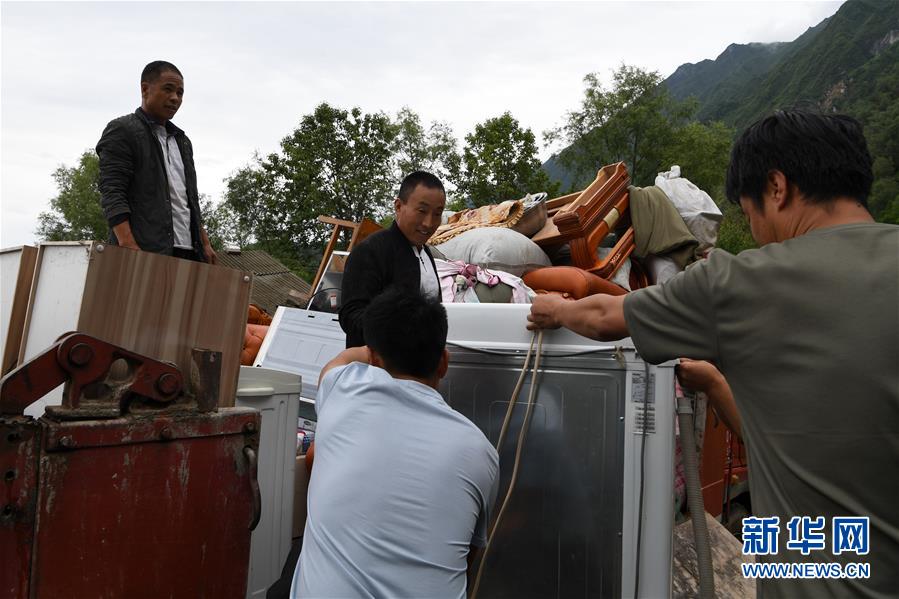 （新華全媒+）（9）千里“挪窩”，踏實(shí)開啟新生活