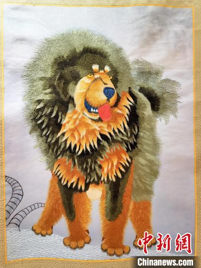 圖為藏繡作品?！∑钤鲚?攝